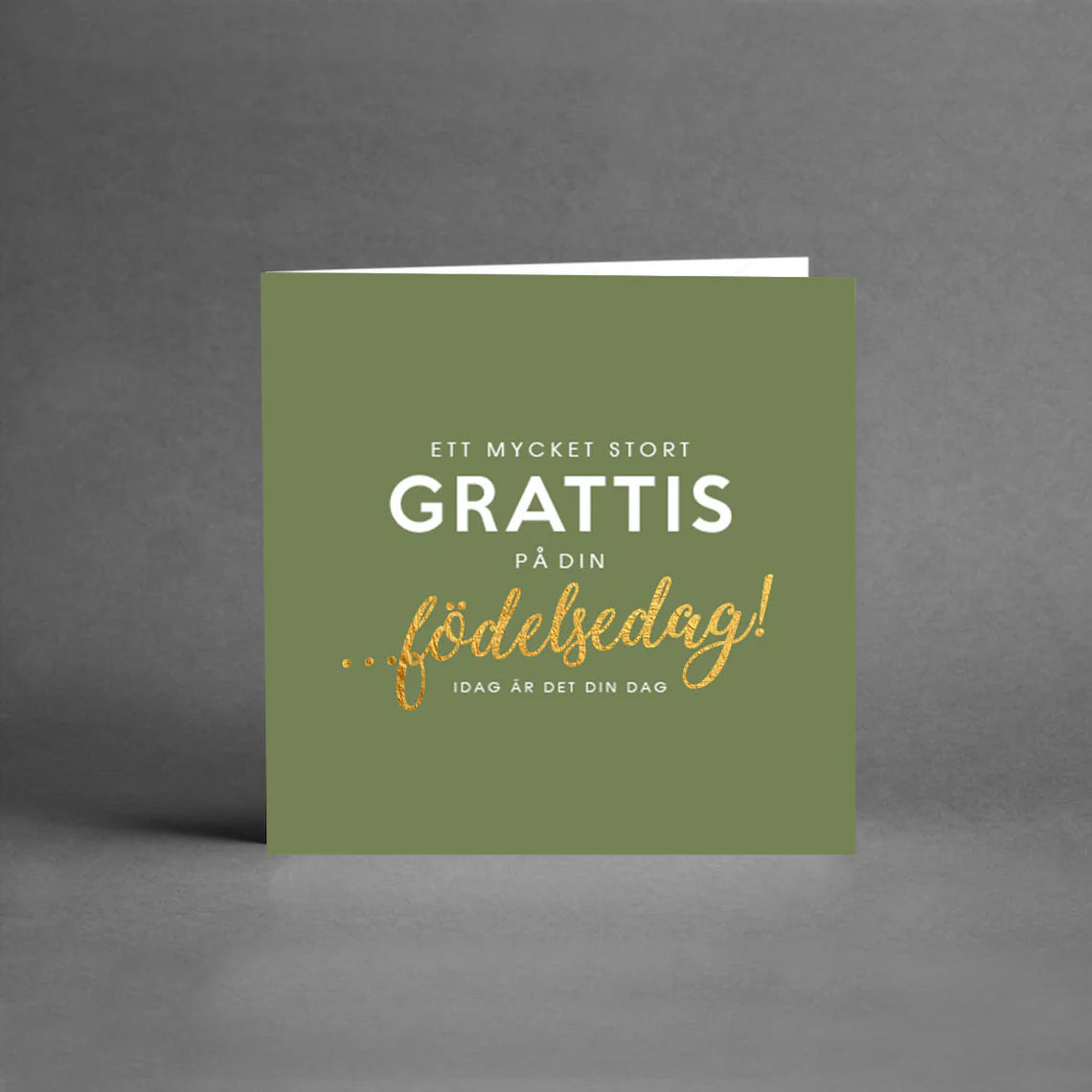 Ett grönt hälsningskort med texten "Ett mycket stort Grattis på din födelsedag! Idag är det din dag".