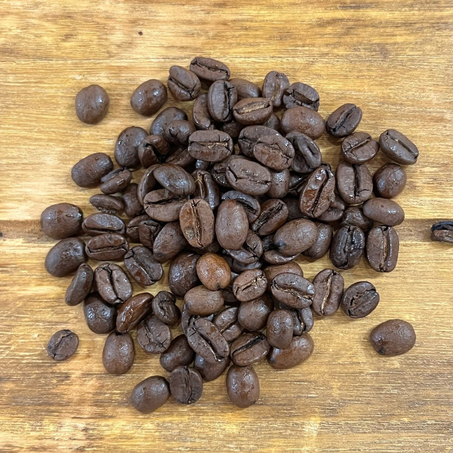 Kaffebönor i hög - Mocca Sanani